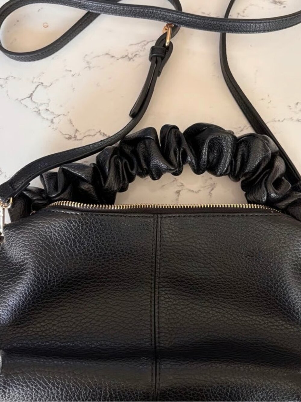 Black small crossbody purse with ruffled handle